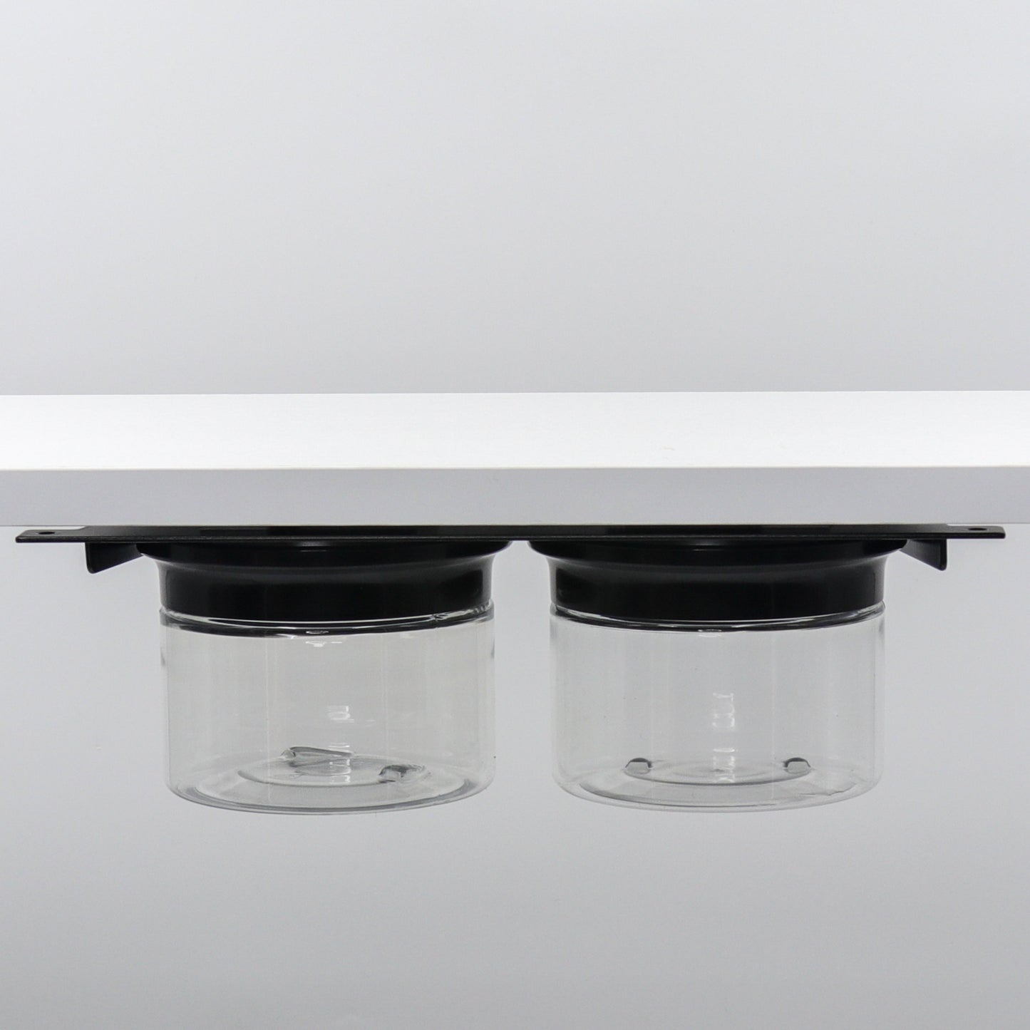 Under Sink/Under Shelf Organizer, Stainless POS with two jars and black lids mounted under shelf, ideal for small space organization.
