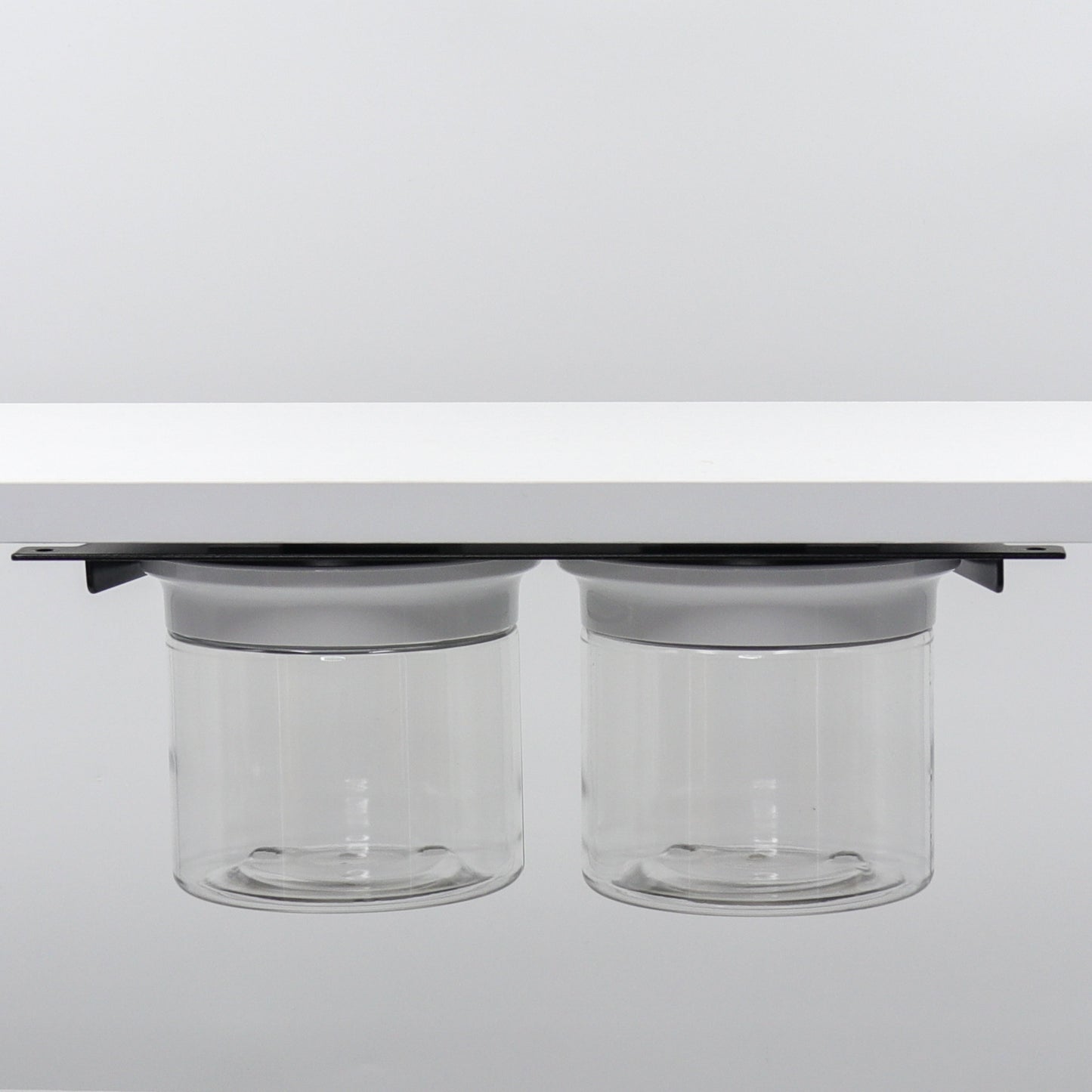 Under Sink/Under Shelf Organizer, Stainless POS with two clear jars and white lids mounted under shelf for efficient storage solution.