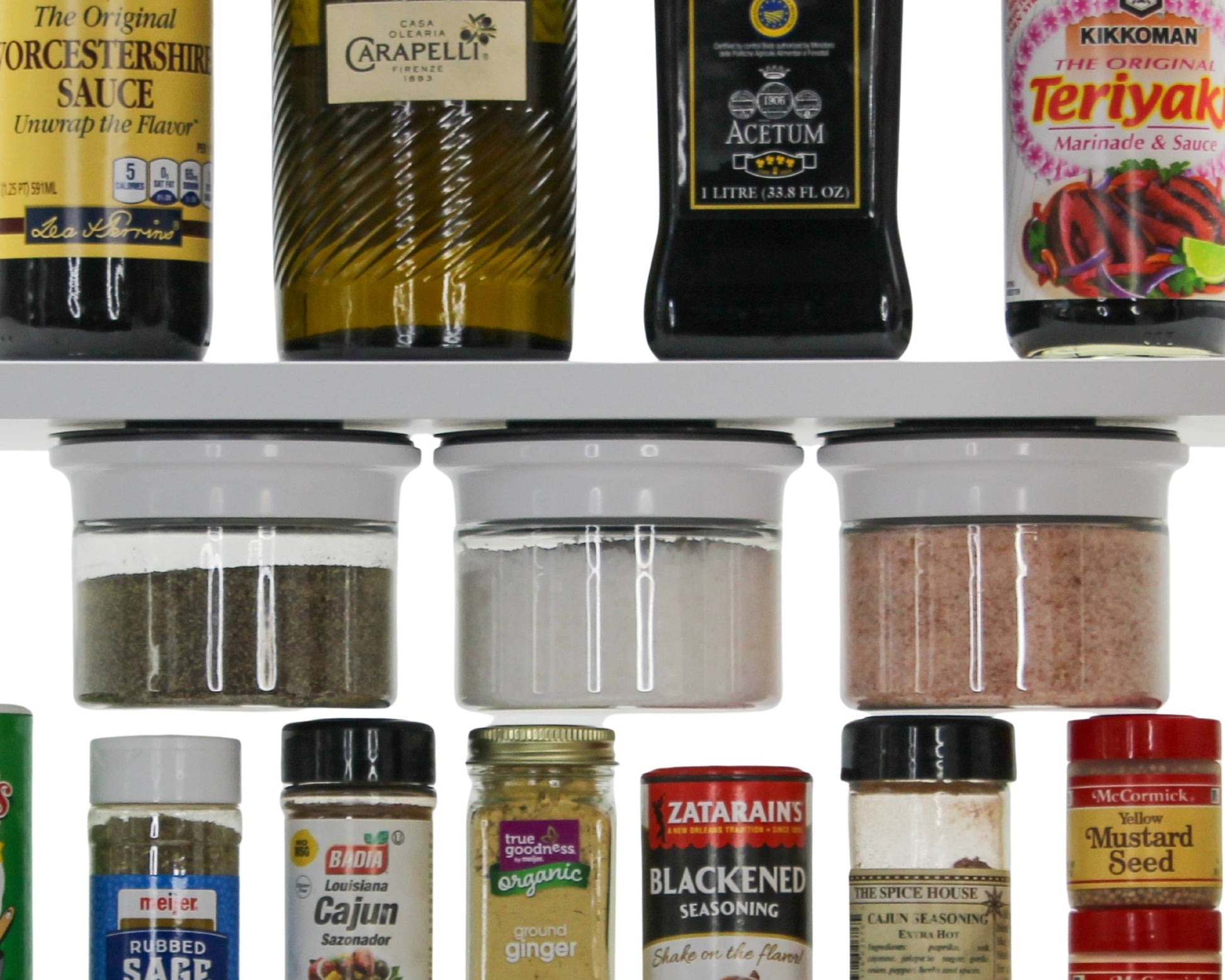 Under shelf Kitchen Organizer Stash Jars storing spices and seasonings in airtight jars, optimizing vertical space in kitchen cabinets.