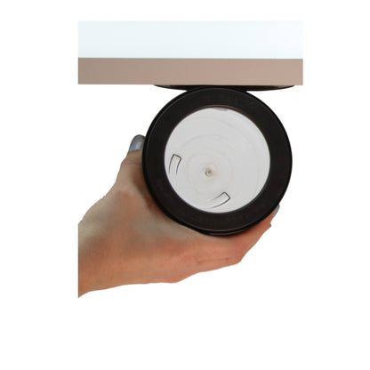 Hand holding a stash jar showing the magnetic lid mechanism, designed for quick access and secure under shelf storage.