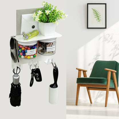 Wall Mounted Entryway Organizer with shelf, key hooks, and jars, styled with flowers and essentials, perfect for decluttering small spaces.